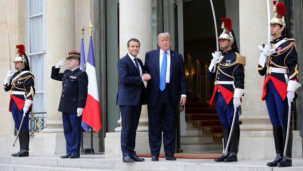 French President Emmanuel Macron greets U.S. President Donald Trump at the Elysee Palace in Paris, France, July 13, 2017. - Sputnik International