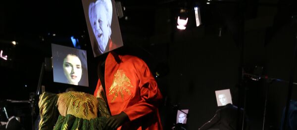 Two costumes made for the 1992 film Bram Stoker's Dracula, by designer Eiko Ishioka, showing a dress worn by the characters Mina Murray/ Elizabeth played actress Winona Ryder and the red cape worn by Count Dracula played by actor Gary Oldman on display at the Hollywood Costume exhibition at the Victoria and Albert museum in London, Tuesday, Oct. 16, 2012. Two costumes made for the 1992 film Bram Stoker's Dracula, by designer Eiko Ishioka, showing a dress worn by the characters Mina Murray/ Elizabeth played actress Winona Ryder and the red cape worn by Count Dracula played by actor Gary Oldman on display at the Hollywood Costume exhibition at the Victoria and Albert museum in London, Tuesday, Oct. 16, 2012. - Sputnik International