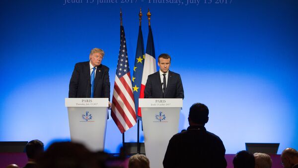 US President Donald Trump, left, and French President Emmanuel Macron during a news conference following a meeting in Paris - Sputnik International