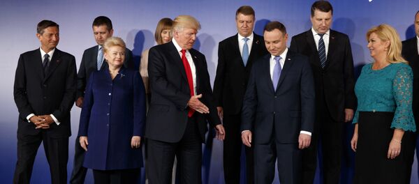 U.S President Donald Trump, center, participates in a group photo prior to the Three Seas Initiative transatlantic roundtable in the Great Assembly Hall of the Royal Castle, in Warsaw, Thursday July 6, 2017 U.S President Donald Trump, center, participates in a group photo prior to the Three Seas Initiative transatlantic roundtable in the Great Assembly Hall of the Royal Castle, in Warsaw, Thursday July 6, 2017 - Sputnik International