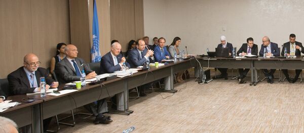 UN Special Envoy of the Secretary-General for Syria Staffan de Mistura (3rd L) attends a new round of negotiation with Syria's main opposition High Negotiations Committee (HNC) leader Nasr al-Hariri during the Intra Syria talks, at Palais des Nations in Geneva, Switzerland July 14, 2017 UN Special Envoy of the Secretary-General for Syria Staffan de Mistura (3rd L) attends a new round of negotiation with Syria's main opposition High Negotiations Committee (HNC) leader Nasr al-Hariri during the Intra Syria talks, at Palais des Nations in Geneva, Switzerland July 14, 2017 - Sputnik International