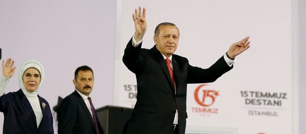 Turkish President Tayyip Erdogan and his wife Emine Erdogan greet their supporters as they arrive for a ceremony marking the first anniversary of the attempted coup at the Bosphorus Bridge in Istanbul, Turkey July 15, 2017 Turkish President Tayyip Erdogan and his wife Emine Erdogan greet their supporters as they arrive for a ceremony marking the first anniversary of the attempted coup at the Bosphorus Bridge in Istanbul, Turkey July 15, 2017 - Sputnik International