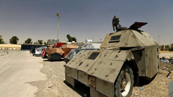 Vehicles used for suicide car bombings, made by Islamic State militants, are seen at Federal Police Headquarters after being confiscated in Mosul, Iraq July 13, 2017 - Sputnik International