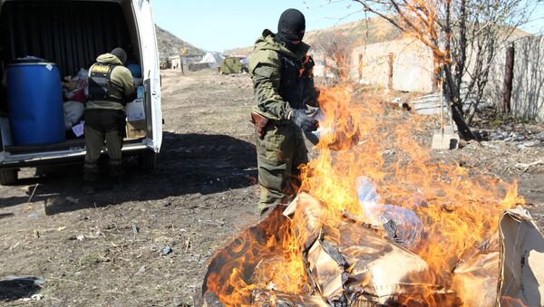 Staff members of the Tatarstan Drug Control Administration dispose of a large lot of confiscated drugs (700 kg) at Kazan's Samosyrovsky firing ground. File photo - Sputnik International