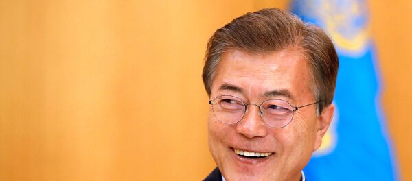 South Korean President Moon Jae-in smiles during Reuters interview in Seoul. South Korean President Moon Jae-in smiles during Reuters interview in Seoul. - Sputnik International