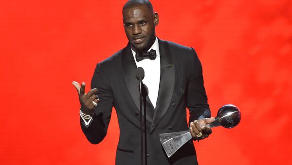 NBA basketball player LeBron James, of the Cleveland Cavaliers, accepts the award for best male athlete at the ESPY Awards at the Microsoft Theater on Wednesday, July 13, 2016, in Los Angeles. - Sputnik International