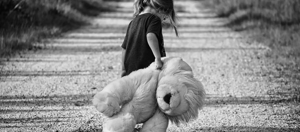 Toddler with a toy - Sputnik International