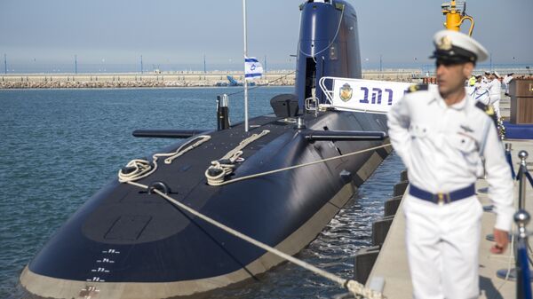 The German-made INS Rahav, the fifth Israeli Navy submarine, arrives at the military port of Haifa on January 12, 2016. In September 2015, Israel received delivery of the fourth Dolphin 2 class submarines from Germany. A third of the cost was funded by Germany as part of its military aid to Israel. The submarines, the most sophisticated in Israel's fleet, can be equipped with missiles armed with nuclear warheads. - Sputnik International