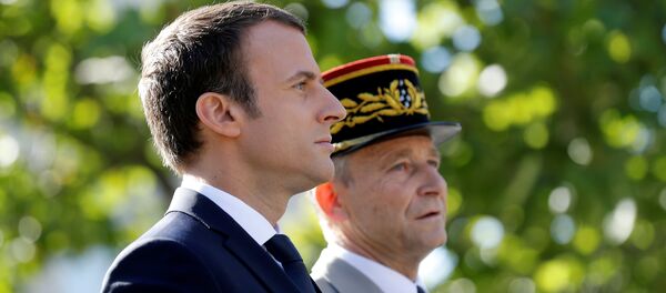French President Emmanuel Macron (L) and Chief of the Defence Staff, French Army General Pierre de Villiers arrive for the annual Bastille Day military parade on the Champs-Elysees in Paris, France, July 14, 2017. - Sputnik International