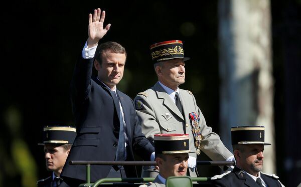 French President Emmanuel Macron and Chief of the Defence Staff French Army General Pierre de Villiers arrive in a command car for the traditional Bastille Day military parade on the Champs-Elysees in Paris, France, July 14, 2017. - Sputnik International