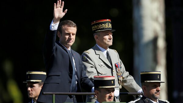 French President Emmanuel Macron and Chief of the Defence Staff French Army General Pierre de Villiers arrive in a command car for the traditional Bastille Day military parade on the Champs-Elysees in Paris, France, July 14, 2017. - Sputnik International
