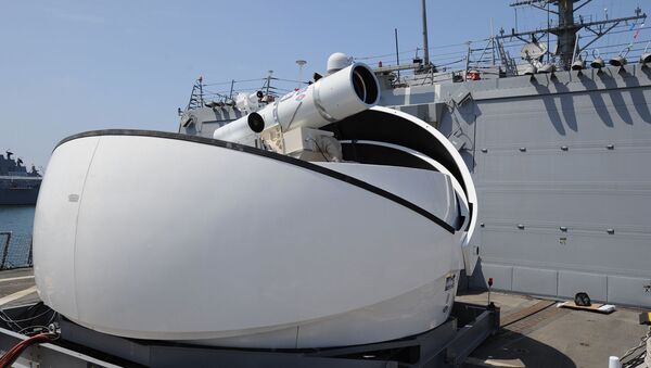 The Laser Weapon System (LaWS) temporarily installed aboard the guided-missile destroyer USS Dewey (DDG 105) in San Diego, Calif. - Sputnik International