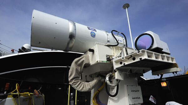 The Laser Weapon System (LaWS) temporarily installed aboard the guided-missile destroyer USS Dewey (DDG 105) in San Diego, Calif. - Sputnik International