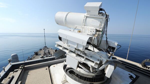 The Afloat Forward Staging Base (Interim) USS Ponce (ASB(I) 15) conducts an operational demonstration of the Office of Naval Research (ONR)-sponsored Laser Weapon System (LaWS) while deployed to the Gulf. File photo  - Sputnik International