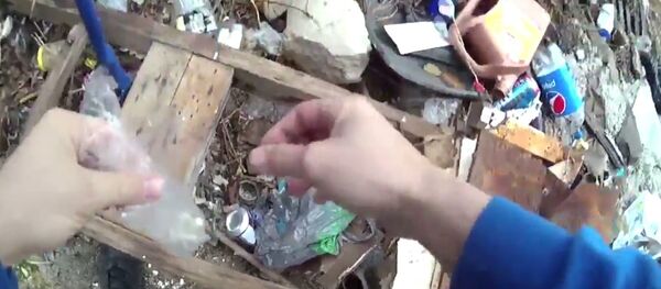 Baltimore police officer Richard Pinheiro is caught by his own body cam planting drug Baltimore police officer Richard Pinheiro is caught by his own body cam planting drug - Sputnik International