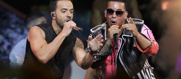 FILE - In this April 27, 2017 file photo, singers Luis Fonsi, left and Daddy Yankee perform during the Latin Billboard Awards in Coral Gables, Fla. Malaysia has banned their hit song Despacito on state radio and television, though it might be hard to slow the song's record-breaking popularity. - Sputnik International