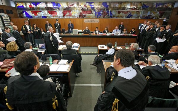 Photo taken on November 5, 2015 shows prosecutor Giuseppe Cascini (L) speaking next to the lawyer of Massimo Carminati, Bruno Giosue Naso (R) at Rome's tribunal, on the opening day of the Mafia Capitale trial, a case related to the alleged infiltration of City Hall by a mafia network. Photo taken on November 5, 2015 shows prosecutor Giuseppe Cascini (L) speaking next to the lawyer of Massimo Carminati, Bruno Giosue Naso (R) at Rome's tribunal, on the opening day of the Mafia Capitale trial, a case related to the alleged infiltration of City Hall by a mafia network. - Sputnik International