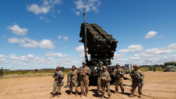 U.S. soldiers stand next to the long-range air defence system Patriot during Toburq Legacy 2017 air defence exercise in the military airfield near Siauliai, Lithuania, July 20, 2017 - Sputnik International