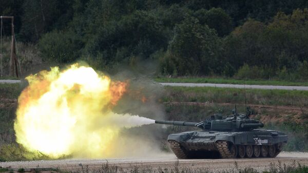 A T-90 tank shoots during a demo exercise at Alabino base (File) - Sputnik International