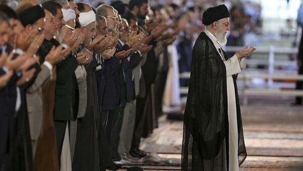 Supreme Leader Ayatollah Ali Khamenei leads Eid al-Fitr prayer marking the end of the Muslim holy fasting month of Ramadan, at Imam Khomeini Grand Mosque, in Tehran, Iran, Monday, June 26, 2017 - Sputnik International