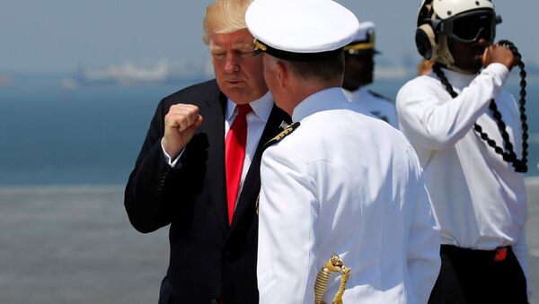 US President Donald Trump bids farewell to US Navy Captain Richard McCormack after commissioning the aircraft carrier USS Gerald R. Ford during a ceremony at Naval Station Norfolk in Norfolk, Virginia, US July 22, 2017. - Sputnik International