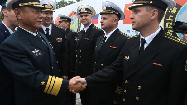 From left: Vice-Admiral Tian Zhong, Deputy Commander of the Chinese Navy, and Vice-Admiral Alexander Fedotenkov, Deputy Commander of the Russian Navy, during a greeting ceremony for the Chinese Navy warships that arrived in Baltiysk for the 2017 Naval Cooperation Russia-China drills - Sputnik International
