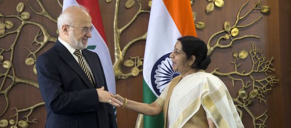 Indian Foreign Minister Sushma Swaraj, right, shakes hands with her Iraqi counterpart Ibrahim al-Jaafari in New Delhi, India, Monday, July 24, 2017. Al-Jaafari is on a five-day official visit to India Indian Foreign Minister Sushma Swaraj, right, shakes hands with her Iraqi counterpart Ibrahim al-Jaafari in New Delhi, India, Monday, July 24, 2017. Al-Jaafari is on a five-day official visit to India - Sputnik International