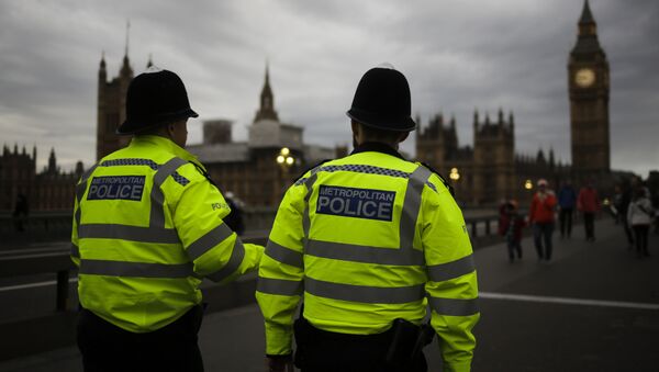 Police officers patrol Westminster Bridge with the Houses of Parliament in the background, on election day in London, Thursday, June 8, 2017. - Sputnik International