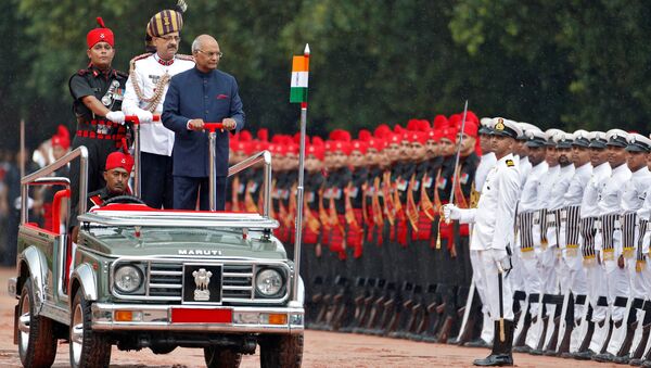 India's new President Ram Nath Kovind inspects an honour guard after being sworn in at the Rashtrapati Bhavan presidential palace in New Delhi, India July 25, 2017 - Sputnik International