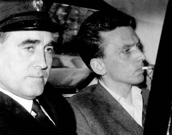 In this file photo dated Oct. 1965, Ian Brady, right, is escorted as he arrives at the courthouse in Hyde, Cheshire, England, to be convicted of the Moors murders of five children together with accomplice Myra Hindley in the Greater Manchester area of England. - Sputnik International