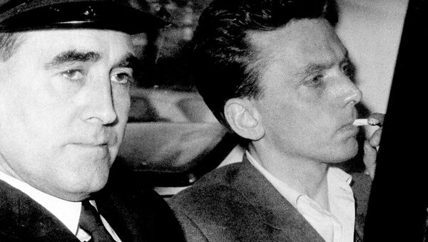 In this file photo dated Oct. 1965, Ian Brady, right, is escorted as he arrives at the courthouse in Hyde, Cheshire, England, to be convicted of the Moors murders of five children together with accomplice Myra Hindley in the Greater Manchester area of England. - Sputnik International