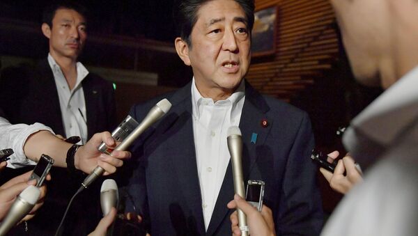 Japanese Prime Minister Shinzo Abe speaks to reporters about North Korea's missile launch in Tokyo, Japan in this photo taken by Kyodo on July 29, 2017 - Sputnik International