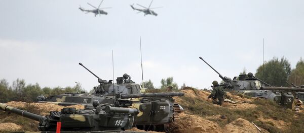Mi-24 helicopters involved in the joint strategic exercises West-2013 by the Russian and Belarusian armed forces on the Gozhsky range, Grodno Region. (File) - Sputnik International