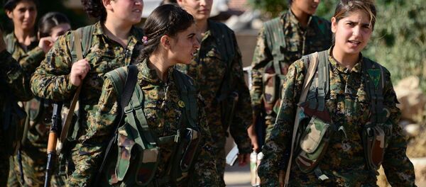 Female fighters of the YPJ play a significant combat role in Rojava. Female fighters of the YPJ play a significant combat role in Rojava. - Sputnik International