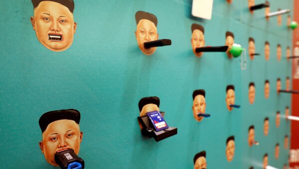 Donated flash drives are shown with images of North Korean leader Kim Jong-un on Human Rights Foundation's Flash Drives for Freedom wall during the Def Con hacker convention in Las Vegas, Nevada, U.S. on July 29, 2017 - Sputnik International