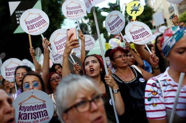 Women rights activists shout slogans during a protest against what they say are violence and animosity they face from men demanding they dress more conservatively, in Istanbul, Turkey, July 29, 2017 Women rights activists shout slogans during a protest against what they say are violence and animosity they face from men demanding they dress more conservatively, in Istanbul, Turkey, July 29, 2017 - Sputnik International