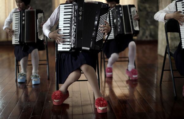 School girls perform a song during an accordion class, Thursday, May 7, 2015, in Pyongyang, North Korea School girls perform a song during an accordion class, Thursday, May 7, 2015, in Pyongyang, North Korea - Sputnik International