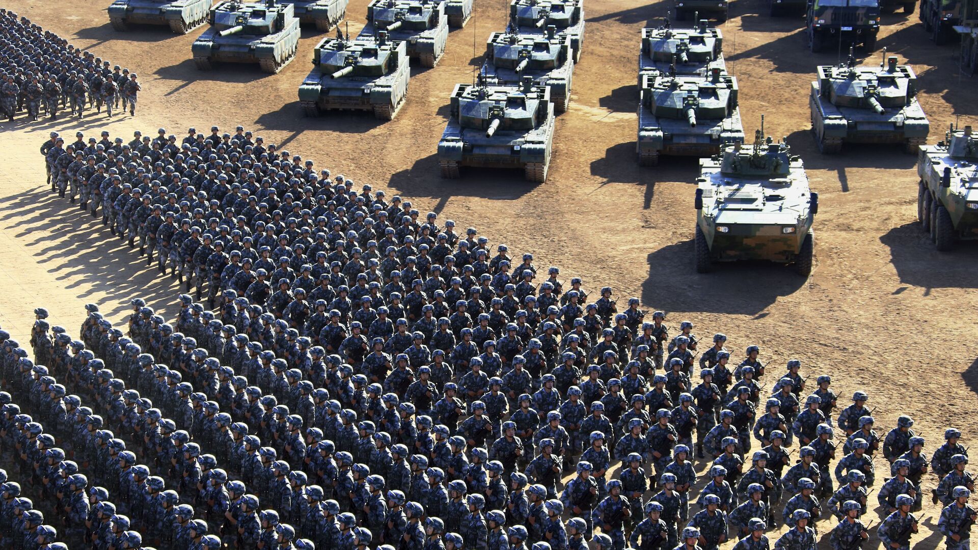 In this photo released by China's Xinhua News Agency, Chinese People's Liberation Army (PLA) troops march past military vehicles Sunday, July 30, 2017 as they arrive for a military parade to commemorate the 90th anniversary of the founding of the PLA on Aug. 1 at Zhurihe training base in north China's Inner Mongolia Autonomous Region - Sputnik International, 1920, 08.06.2021