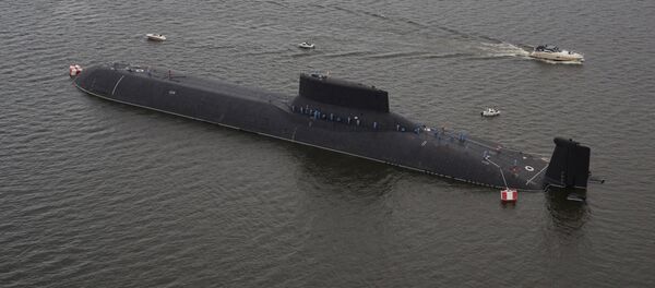 An aerial view shows the Russian nuclear submarine Dmitry Donskoy moored on the eve of the the Navy Day parade in Kronshtadt, a seaport town in the suburb of St. Petersburg, Russia, July 28, 2017 - Sputnik International