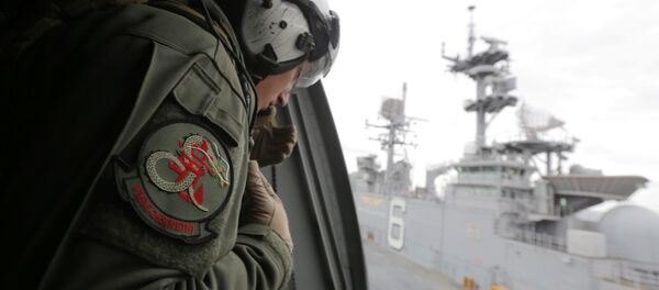 A crewman aboard a US Marine MV-22B Osprey aircraft looks out as it lifts off the deck of the USS Bonhomme Richard amphibious assault ship off the coast of Sydney, Australia, Thursday, 29 June 2017 after a ceremony on board the ship marking the start of Talisman Saber 2017, a biennial joint military exercise between the United States and Australia A crewman aboard a US Marine MV-22B Osprey aircraft looks out as it lifts off the deck of the USS Bonhomme Richard amphibious assault ship off the coast of Sydney, Australia, Thursday, 29 June 2017 after a ceremony on board the ship marking the start of Talisman Saber 2017, a biennial joint military exercise between the United States and Australia - Sputnik International