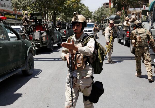 Afghan security forces arrive during gun fire at the site of an attack in Kabul, Afghanistan July 31, 2017 - Sputnik International
