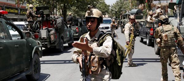 Afghan security forces arrive during gun fire at the site of an attack in Kabul, Afghanistan July 31, 2017 Afghan security forces arrive during gun fire at the site of an attack in Kabul, Afghanistan July 31, 2017 - Sputnik International