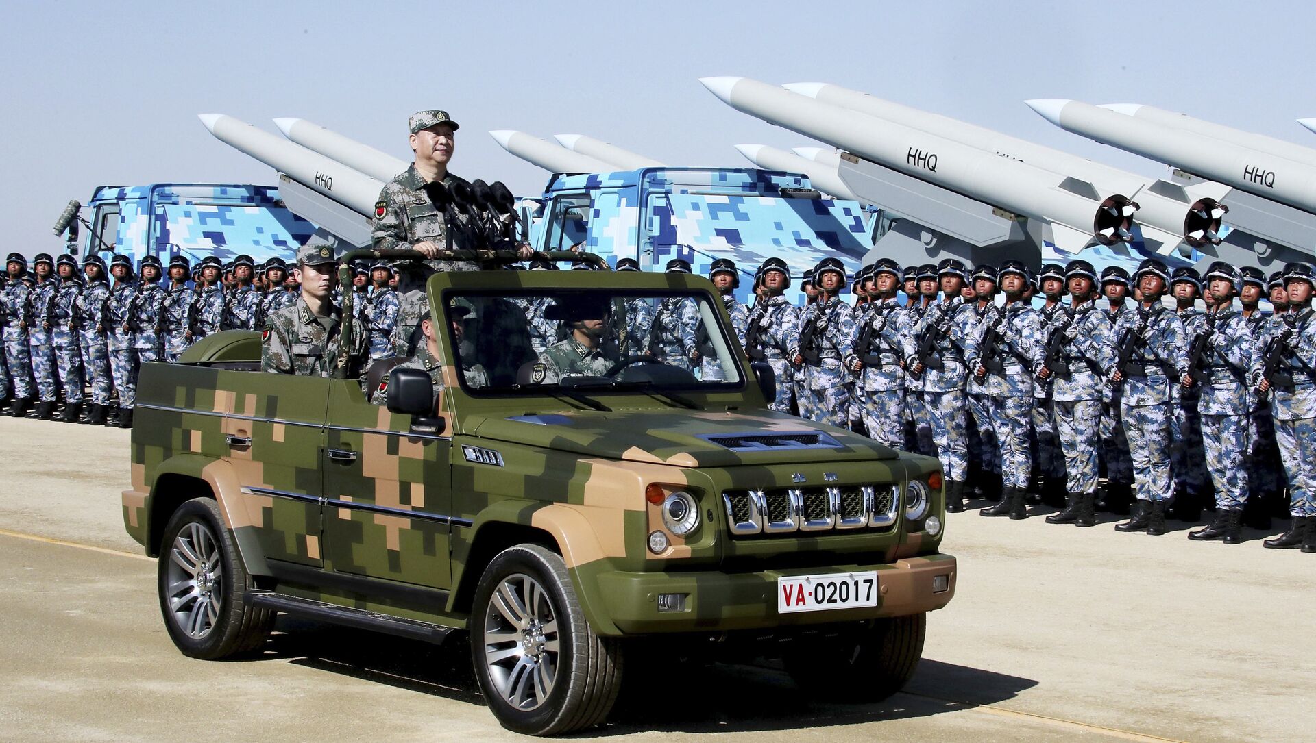 In this photo released by Xinhua News Agency, Chinese President Xi Jinping stands on a military jeep as he inspects troops of the People's Liberation Army during a military parade to commemorate the 90th anniversary of the founding of the PLA at Zhurihe training base in north China's Inner Mongolia Autonomous Region, Sunday, July 30, 2017 - Sputnik International, 1920, 09.03.2021