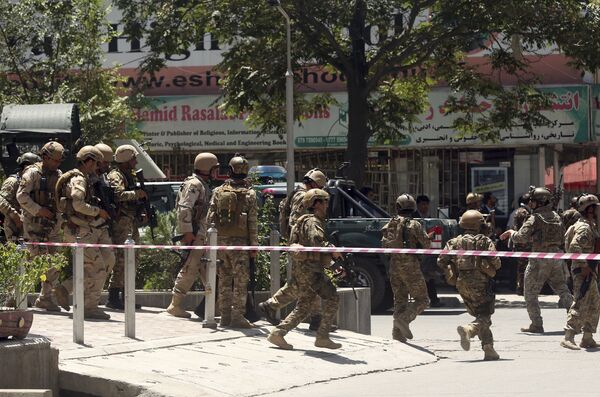 Security forces respond at the site of a suicide attack followed by a clash between Afghanistan's forces and IS fighters during an attack on Iraq embassy in Kabul, Afghanistan, Monday, July 31, 2017 Security forces respond at the site of a suicide attack followed by a clash between Afghanistan's forces and IS fighters during an attack on Iraq embassy in Kabul, Afghanistan, Monday, July 31, 2017 - Sputnik International