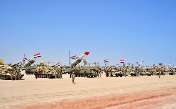 Military students stand at attention to mark the opening of the Mohamed Najib military base, the graduation of new graduates from military colleges, and the celebration of the 65th anniversary of the July 23 revolution at El Hammam City in the North Coast, in Marsa Matrouh, Egypt, July 22, 2017 in this handout picture courtesy of the Egyptian Presidency - Sputnik International