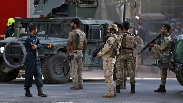 Afghan security forces leave after gunfire at the site of an attack in Kabul, Afghanistan July 31, 2017 - Sputnik International