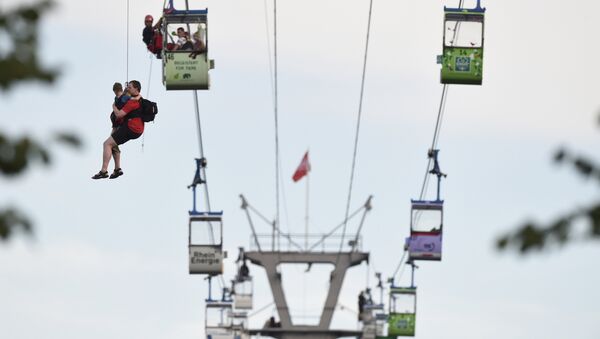 Members of the fire service rescue people from cable car gondolas, in Cologne, Germany, Sunday, July 30, 2017. - Sputnik International
