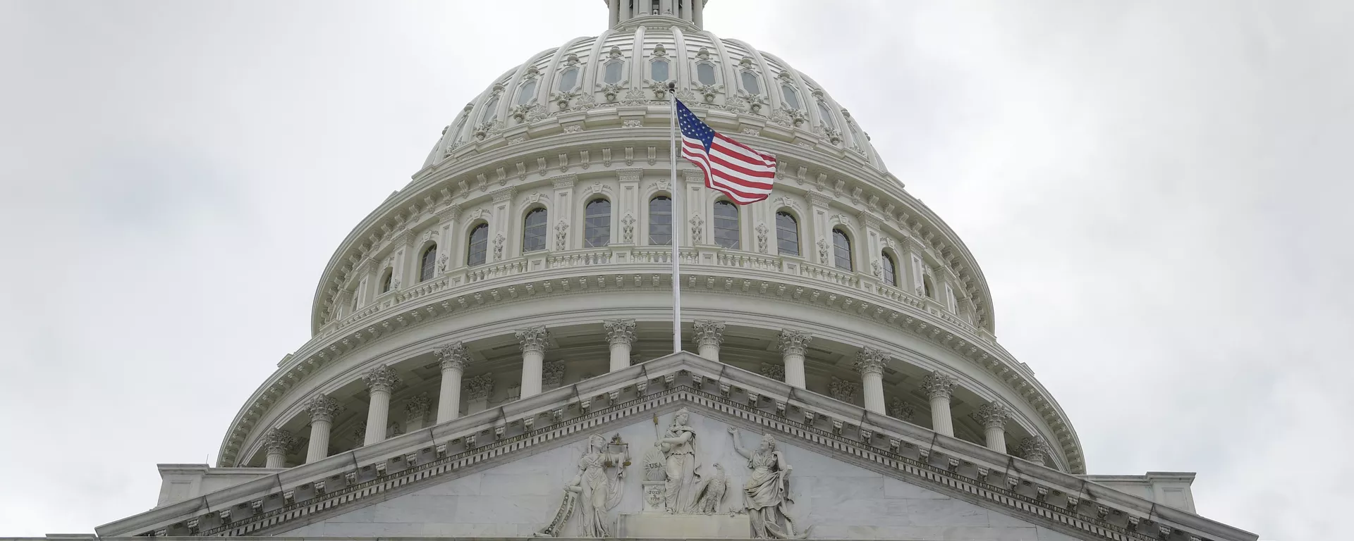 In this May 4, 2017, file photo, the U.S. flag flies in front of the Capitol dome on Capitol Hill in Washington - Sputnik International, 1920, 09.01.2025