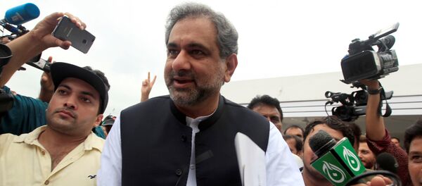 Pakistan's former Petroleum Minister and Prime Minister designate Shahid Khaqan Abbasi arrives to attend the National Assembly session in Islamabad, Pakistan August 1, 2017 Pakistan's former Petroleum Minister and Prime Minister designate Shahid Khaqan Abbasi arrives to attend the National Assembly session in Islamabad, Pakistan August 1, 2017 - Sputnik International