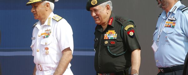Indian Army Chief Bipin Rawat, center, Air Force Chief Birender Singh Dhanoa, right, and Navy Chief Sunil Lanba arrive at the opening ceremony of Aero India 2017 at Yelahanka air base in Bangalore, India, Tuesday, Feb. 14, 2017 Indian Army Chief Bipin Rawat, center, Air Force Chief Birender Singh Dhanoa, right, and Navy Chief Sunil Lanba arrive at the opening ceremony of Aero India 2017 at Yelahanka air base in Bangalore, India, Tuesday, Feb. 14, 2017 - Sputnik International